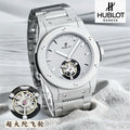 first flywheel wristwatch closest to a tourbillon